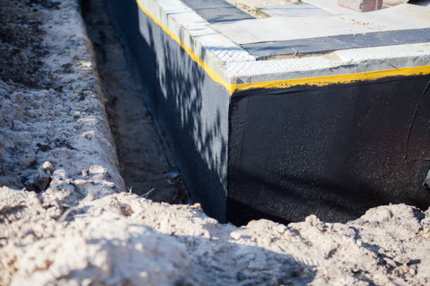 Professional Exterior Waterproofing technician working in Hudson, NC
